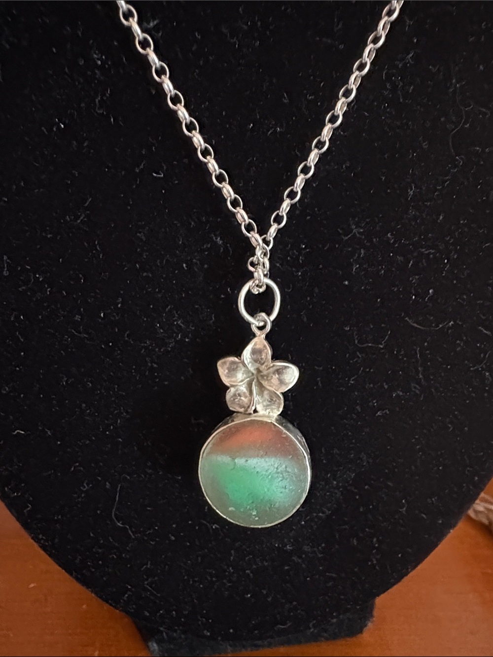 Silver plumeria Pendant Necklace with sea glass marble Green-Orange Glass Accent